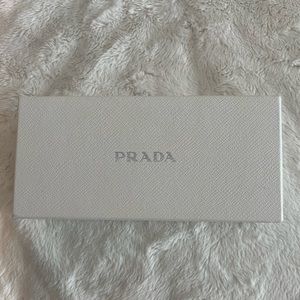 Prada sunglasses box ONLY- no glasses. Lens cleaner. Like new.